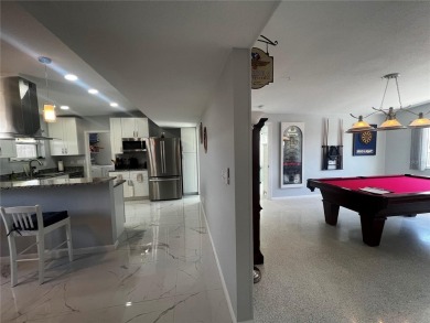 This Adorable Pool Home is located at the end of a cul-de-sac on on Port Charlotte Golf Club in Florida - for sale on GolfHomes.com, golf home, golf lot