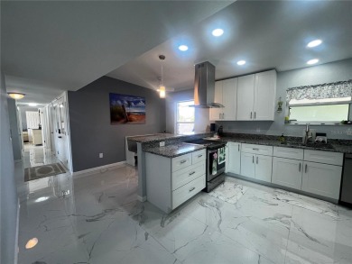 This Adorable Pool Home is located at the end of a cul-de-sac on on Port Charlotte Golf Club in Florida - for sale on GolfHomes.com, golf home, golf lot