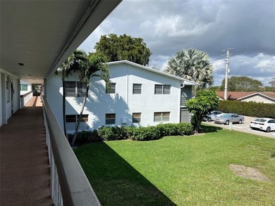 Come see it now! Corner 2nd floor 1 br/1.5 bth with CENTRAL A/C on Hillsboro Pines Golf in Florida - for sale on GolfHomes.com, golf home, golf lot