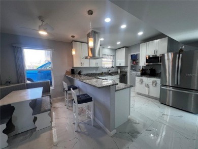 This Adorable Pool Home is located at the end of a cul-de-sac on on Port Charlotte Golf Club in Florida - for sale on GolfHomes.com, golf home, golf lot