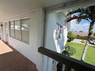 Come see it now! Corner 2nd floor 1 br/1.5 bth with CENTRAL A/C on Hillsboro Pines Golf in Florida - for sale on GolfHomes.com, golf home, golf lot