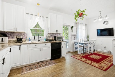 Step into style and comfort in this beautifully updated on Hedingham Golf and Athletic Club in North Carolina - for sale on GolfHomes.com, golf home, golf lot
