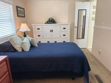 Charming Turnkey Home on a Perimeter Lot!    This home is in on Lake Henry Golf Club in Florida - for sale on GolfHomes.com, golf home, golf lot