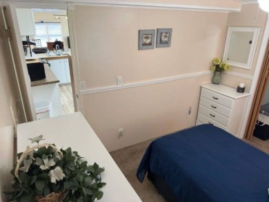 Charming Turnkey Home on a Perimeter Lot!    This home is in on Lake Henry Golf Club in Florida - for sale on GolfHomes.com, golf home, golf lot