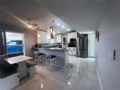 This Adorable Pool Home is located at the end of a cul-de-sac on on Port Charlotte Golf Club in Florida - for sale on GolfHomes.com, golf home, golf lot