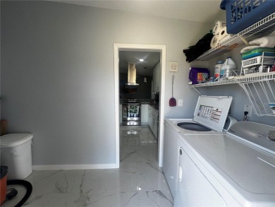 This Adorable Pool Home is located at the end of a cul-de-sac on on Port Charlotte Golf Club in Florida - for sale on GolfHomes.com, golf home, golf lot