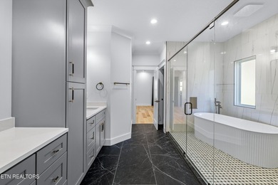 Tucked away on a peaceful cul-de-sac in Tellico Village's on Toqua Golf Course - Loudon County in Tennessee - for sale on GolfHomes.com, golf home, golf lot