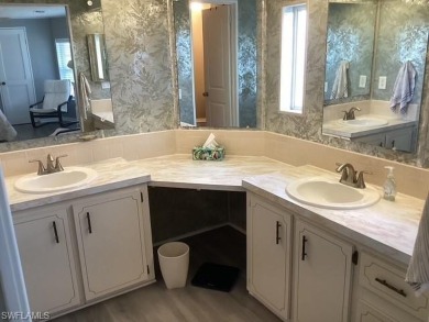 Location! Location! Walk  to everything from this well
cared on Riviera Golf Club in Florida - for sale on GolfHomes.com, golf home, golf lot