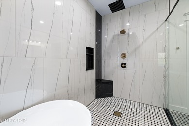 Tucked away on a peaceful cul-de-sac in Tellico Village's on Toqua Golf Course - Loudon County in Tennessee - for sale on GolfHomes.com, golf home, golf lot