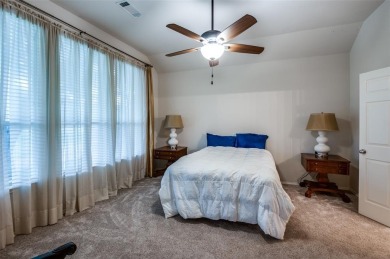 Discover your dream home in this meticulously maintained on Stonebridge Ranch Country Club - Dye in Texas - for sale on GolfHomes.com, golf home, golf lot