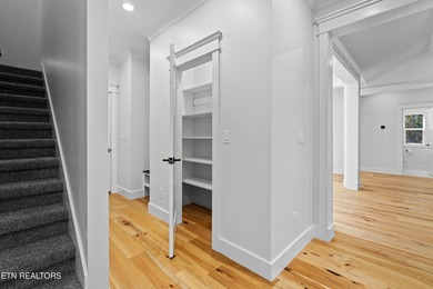 Tucked away on a peaceful cul-de-sac in Tellico Village's on Toqua Golf Course - Loudon County in Tennessee - for sale on GolfHomes.com, golf home, golf lot