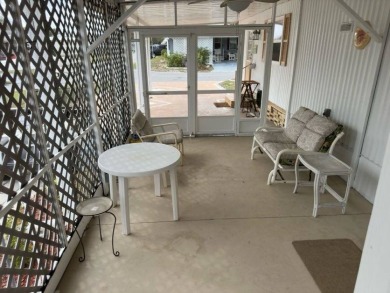 Charming Turnkey Home on a Perimeter Lot!    This home is in on Lake Henry Golf Club in Florida - for sale on GolfHomes.com, golf home, golf lot