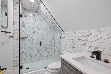 Tucked away on a peaceful cul-de-sac in Tellico Village's on Toqua Golf Course - Loudon County in Tennessee - for sale on GolfHomes.com, golf home, golf lot