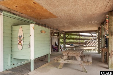 Welcome to your charming beach retreat in Nags Head, NC! This on Nags Head Golf Links in North Carolina - for sale on GolfHomes.com, golf home, golf lot