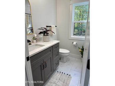 Tucked away on a peaceful cul-de-sac in Tellico Village's on Toqua Golf Course - Loudon County in Tennessee - for sale on GolfHomes.com, golf home, golf lot