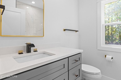 Tucked away on a peaceful cul-de-sac in Tellico Village's on Toqua Golf Course - Loudon County in Tennessee - for sale on GolfHomes.com, golf home, golf lot