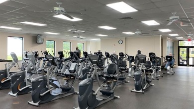 Come see it now! Corner 2nd floor 1 br/1.5 bth with CENTRAL A/C on Hillsboro Pines Golf in Florida - for sale on GolfHomes.com, golf home, golf lot
