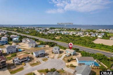 Welcome to your charming beach retreat in Nags Head, NC! This on Nags Head Golf Links in North Carolina - for sale on GolfHomes.com, golf home, golf lot