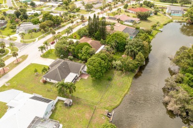 Welcome to your waterfront sanctuary in the highly sought-after on Club Med Sandpiper in Florida - for sale on GolfHomes.com, golf home, golf lot