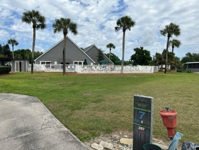 Charming Turnkey Home on a Perimeter Lot!    This home is in on Lake Henry Golf Club in Florida - for sale on GolfHomes.com, golf home, golf lot