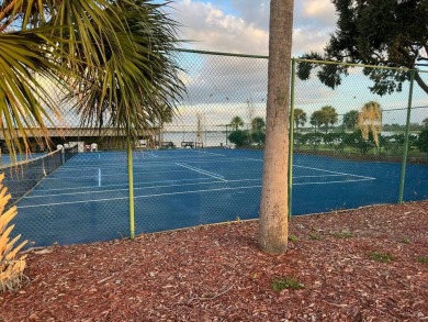 Charming Turnkey Home on a Perimeter Lot!    This home is in on Lake Henry Golf Club in Florida - for sale on GolfHomes.com, golf home, golf lot