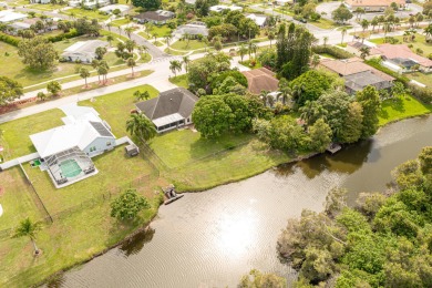 Welcome to your waterfront sanctuary in the highly sought-after on Club Med Sandpiper in Florida - for sale on GolfHomes.com, golf home, golf lot