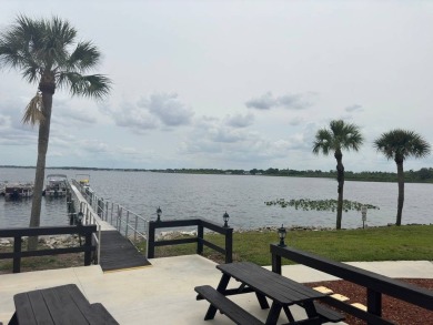 Charming Turnkey Home on a Perimeter Lot!    This home is in on Lake Henry Golf Club in Florida - for sale on GolfHomes.com, golf home, golf lot