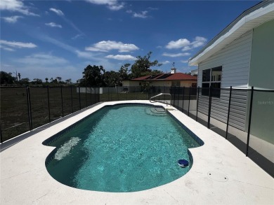 This Adorable Pool Home is located at the end of a cul-de-sac on on Port Charlotte Golf Club in Florida - for sale on GolfHomes.com, golf home, golf lot