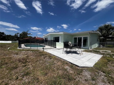 This Adorable Pool Home is located at the end of a cul-de-sac on on Port Charlotte Golf Club in Florida - for sale on GolfHomes.com, golf home, golf lot