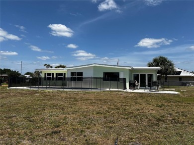 This Adorable Pool Home is located at the end of a cul-de-sac on on Port Charlotte Golf Club in Florida - for sale on GolfHomes.com, golf home, golf lot