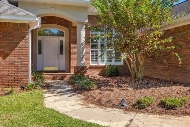 This beautifully landscaped 4-bedroom, 3-bath is an all-brick on The Golf Club At Summerbrooke in Florida - for sale on GolfHomes.com, golf home, golf lot