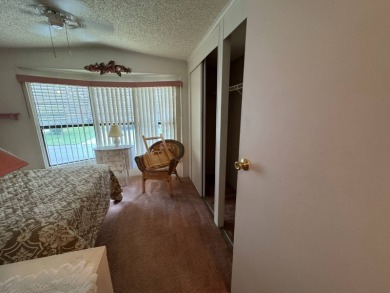 There is tons of space inside & out in this 2/2 sanctuary! It is on Lake Henry Golf Club in Florida - for sale on GolfHomes.com, golf home, golf lot