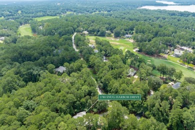 Wooded Retreat in The Landings at Reynolds Lake Oconee. Tucked on Reynolds Lake Oconee - The Landing in Georgia - for sale on GolfHomes.com, golf home, golf lot