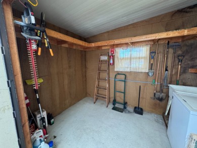 There is tons of space inside & out in this 2/2 sanctuary! It is on Lake Henry Golf Club in Florida - for sale on GolfHomes.com, golf home, golf lot
