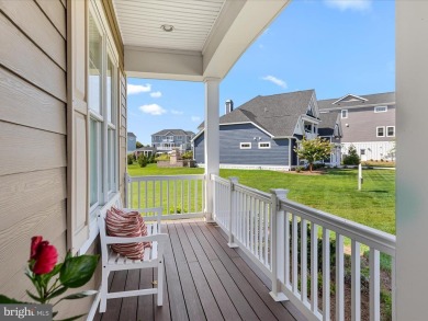 An Elevated Coastal Sanctuary in The Peninsula Welcome to 33530 on The Peninsula Golf and Country Club in Delaware - for sale on GolfHomes.com, golf home, golf lot