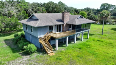 Nestled in Skimmer Cove on Blue Heron Lake, this home offers one on Ocean Point Golf Links in South Carolina - for sale on GolfHomes.com, golf home, golf lot