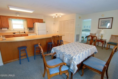 Nestled in Skimmer Cove on Blue Heron Lake, this home offers one on Ocean Point Golf Links in South Carolina - for sale on GolfHomes.com, golf home, golf lot