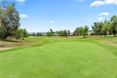 Beautifully upgraded, this Invitational model is located in the on Hemet Golf Club in California - for sale on GolfHomes.com, golf home, golf lot