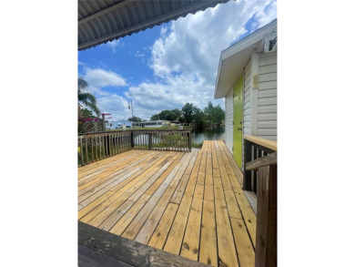 ON THE WATER!! LOW HOA LOW HOA only 219 a month. What a FIND!! a on Cypress Point RV Golf Club in Florida - for sale on GolfHomes.com, golf home, golf lot
