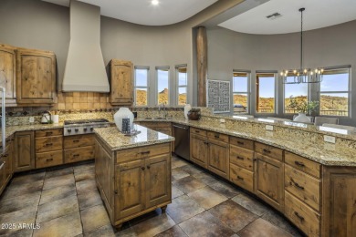 Set within the exclusive 24-hour guard-gated community of Eagle on Eagle Mountain Golf Club in Arizona - for sale on GolfHomes.com, golf home, golf lot