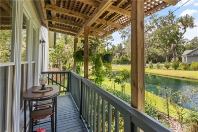 Nestled in gated Hampton Plantation, this charming patio home on The King and Prince Golf Course, Home of the Hampton Club in Georgia - for sale on GolfHomes.com, golf home, golf lot