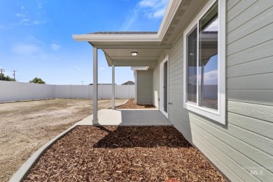 This open floor plan home is a practical design and has an on Scotch Pines Golf Course in Idaho - for sale on GolfHomes.com, golf home, golf lot