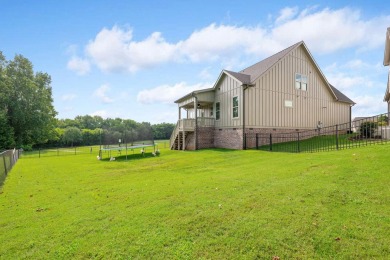 Welcome to 8173 Double Eagle Court, a beautiful home tucked on The Champions Club At Hampton Creek in Tennessee - for sale on GolfHomes.com, golf home, golf lot