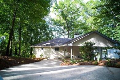 Dive into lakeside luxury at its finest in the heart of Turtle on Turtle Cove Golf Course in Georgia - for sale on GolfHomes.com, golf home, golf lot