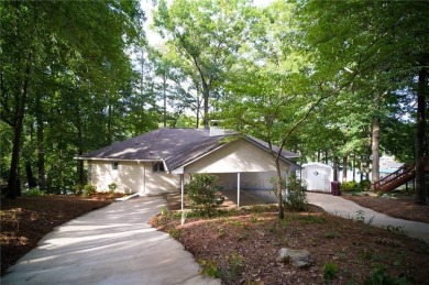 Dive into lakeside luxury at its finest in the heart of Turtle on Turtle Cove Golf Course in Georgia - for sale on GolfHomes.com, golf home, golf lot