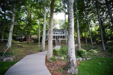 Dive into lakeside luxury at its finest in the heart of Turtle on Turtle Cove Golf Course in Georgia - for sale on GolfHomes.com, golf home, golf lot