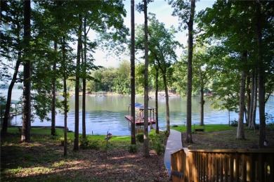 Dive into lakeside luxury at its finest in the heart of Turtle on Turtle Cove Golf Course in Georgia - for sale on GolfHomes.com, golf home, golf lot