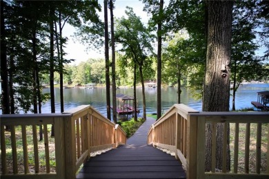 Dive into lakeside luxury at its finest in the heart of Turtle on Turtle Cove Golf Course in Georgia - for sale on GolfHomes.com, golf home, golf lot
