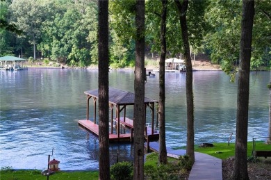 Dive into lakeside luxury at its finest in the heart of Turtle on Turtle Cove Golf Course in Georgia - for sale on GolfHomes.com, golf home, golf lot