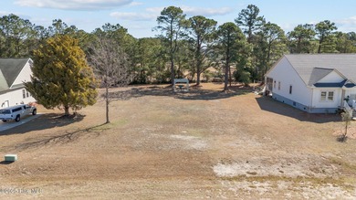 Build Your Dream Home on the Seventh Hole of Harbour Pointe Golf on Harbour Point Golf Club in North Carolina - for sale on GolfHomes.com, golf home, golf lot